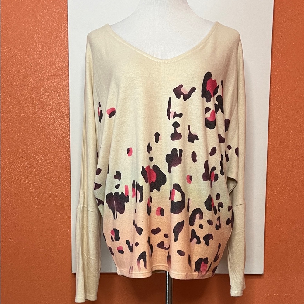 Elegant Cream and Pink Leopard Print Blouse with Open Back